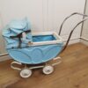 brocante metalen blauwe poppenwagen