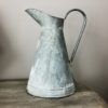 oude zinken waterkan